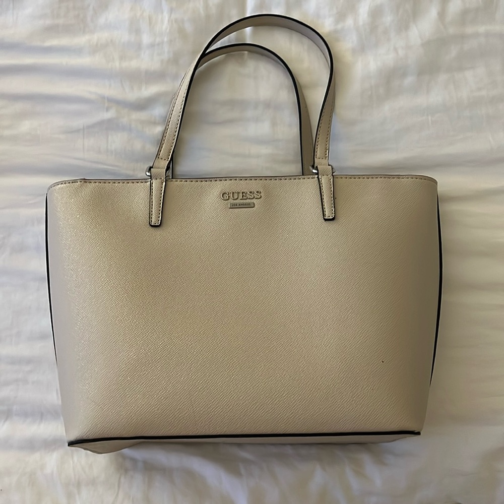 Basically brand new. Beige tote bag